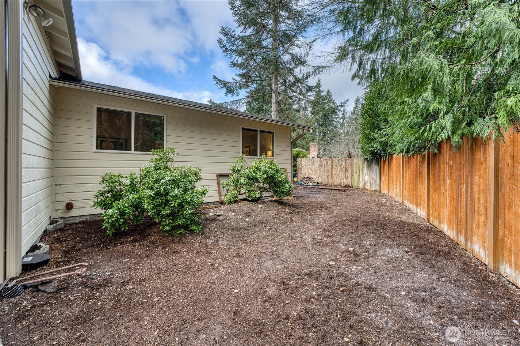 23823 90th Place West Edmonds, WA 98026 - Photo 37 of 40 a view of backyard with potted plants and large tree