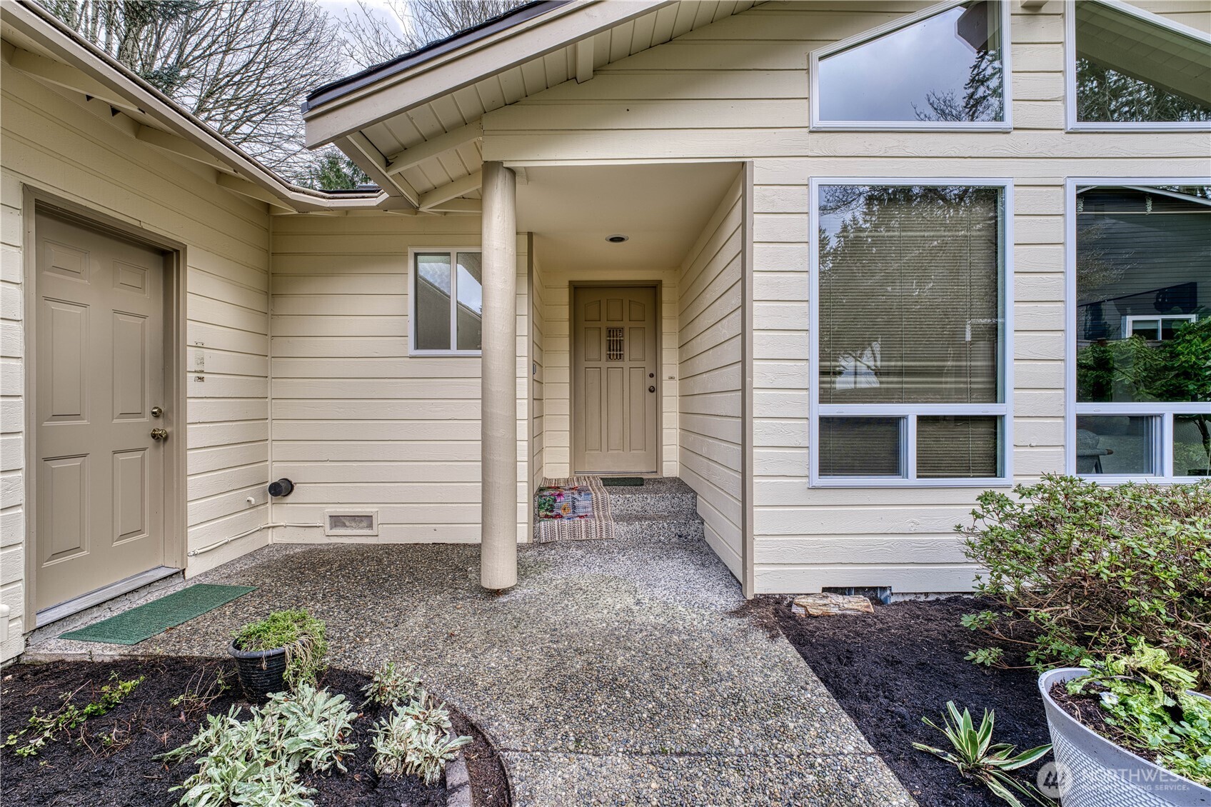 23823 90th Place West Edmonds, WA 98026 - Photo 4 of 40 a view of a house with a yard and chair