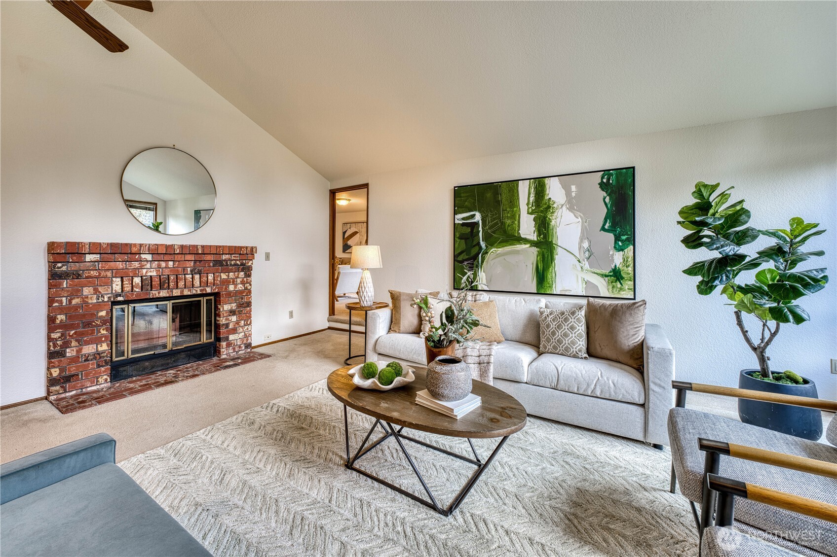 23823 90th Place West Edmonds, WA 98026 - Photo 10 of 40 a living room with furniture a large window and a fireplace