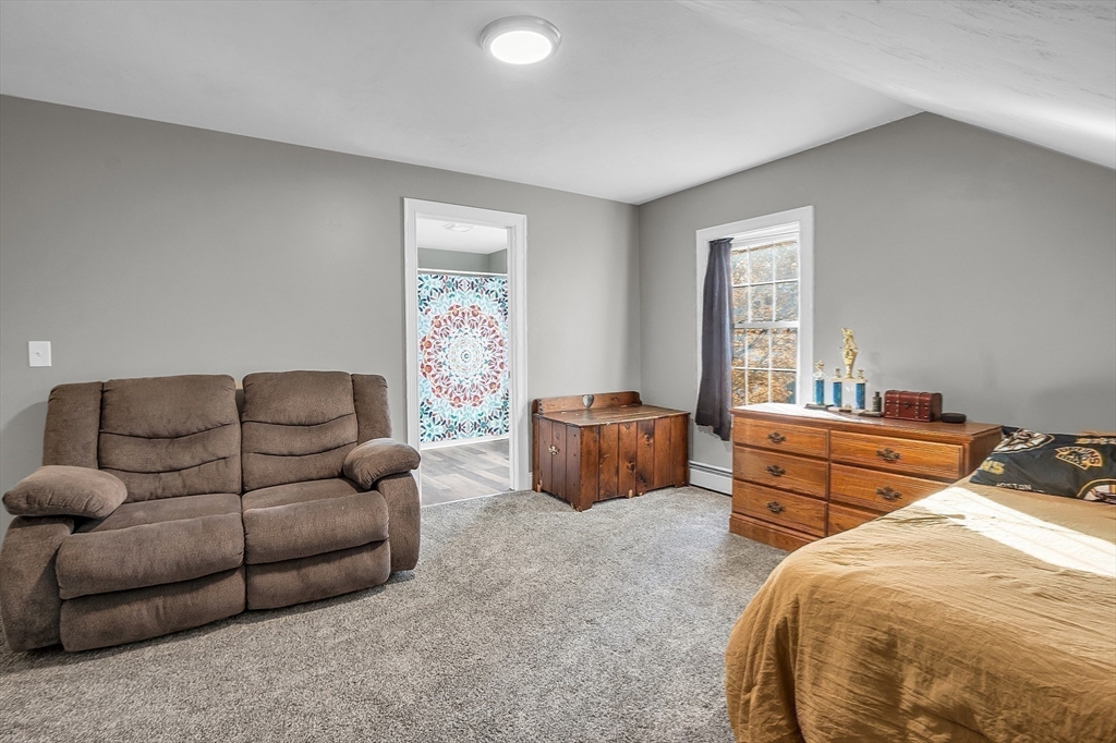 20 Main Street Ashburnham, MA 01430 - Photo 30 of 42 a bedroom with furniture and a bed