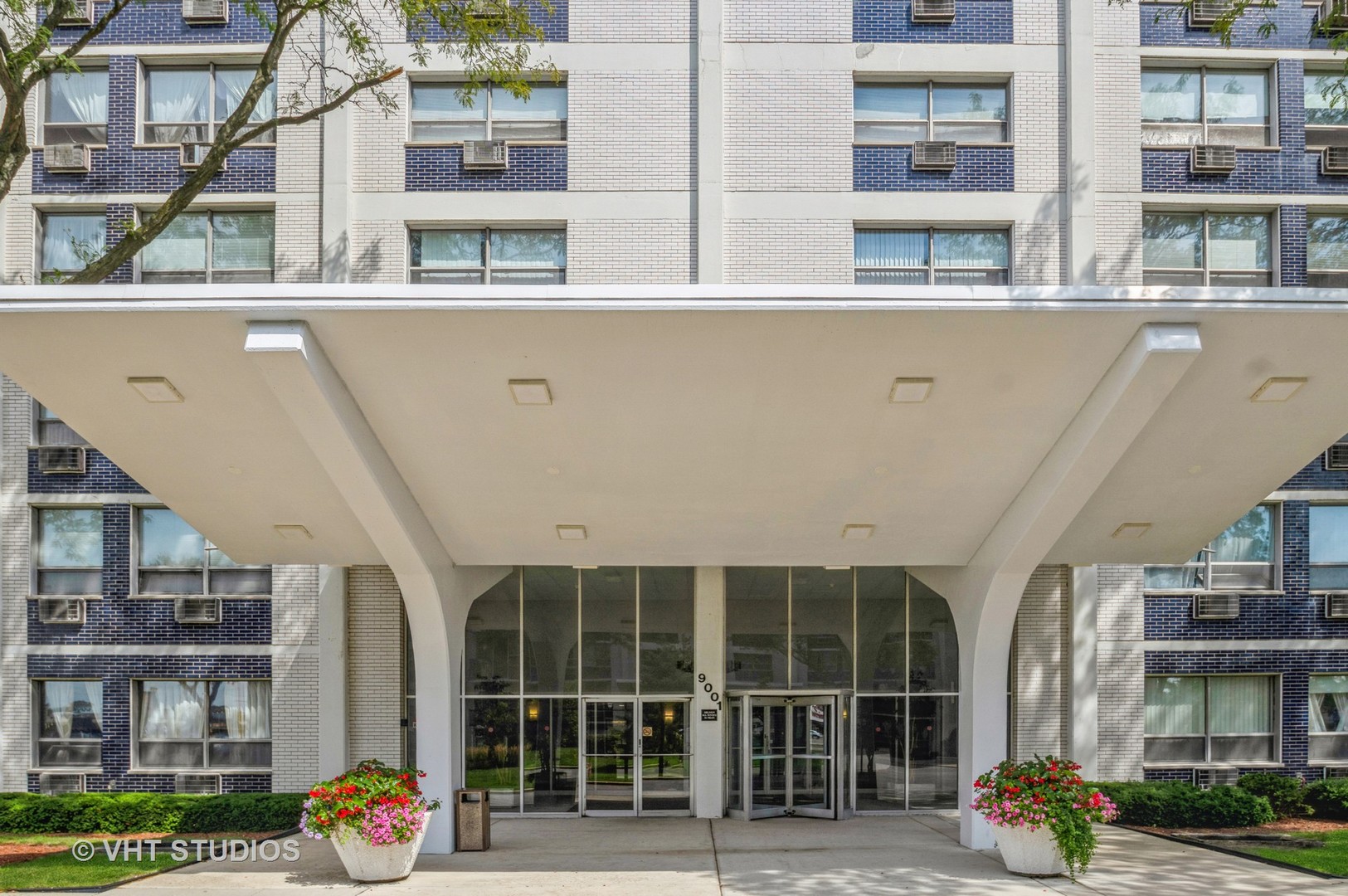 9001 West Golf Road, Unit 5I Des Plaines, IL 60016 - Photo 2 of 14 a front view of a building with street view