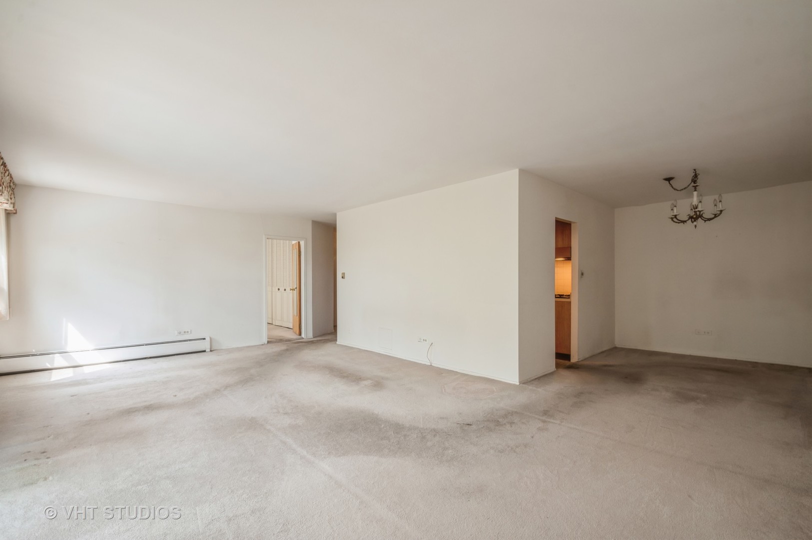 9001 West Golf Road, Unit 5I Des Plaines, IL 60016 - Photo 5 of 14 an empty room with closet and windows