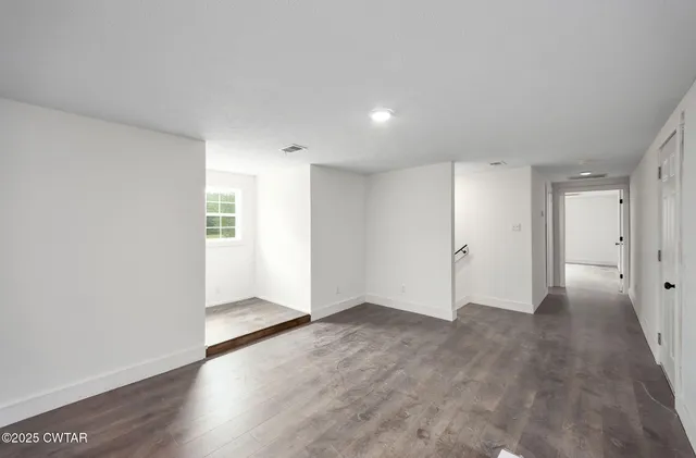 a view of a storage room with racks