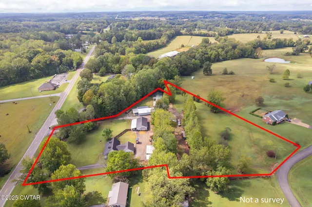 a kitchen with a stove and a white cabinets