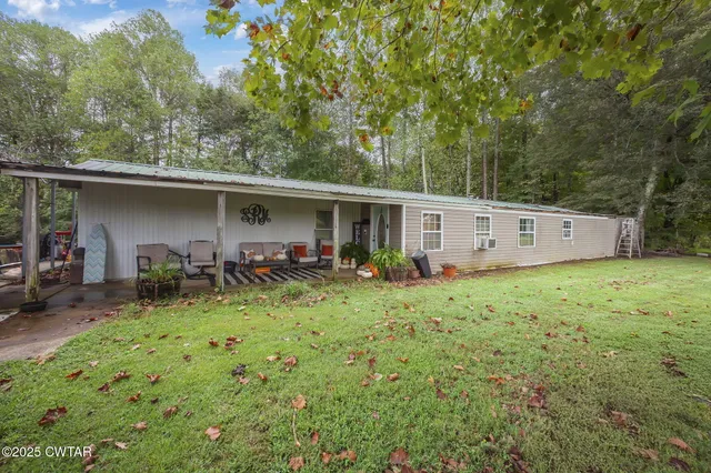 a bathroom with a double vanity sink toilet and shower