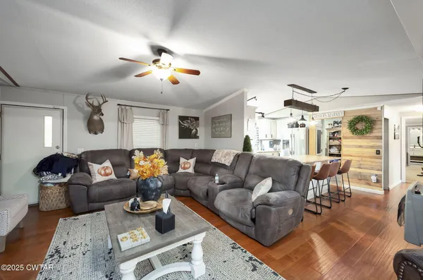 a kitchen with stainless steel appliances refrigerator and cabinets