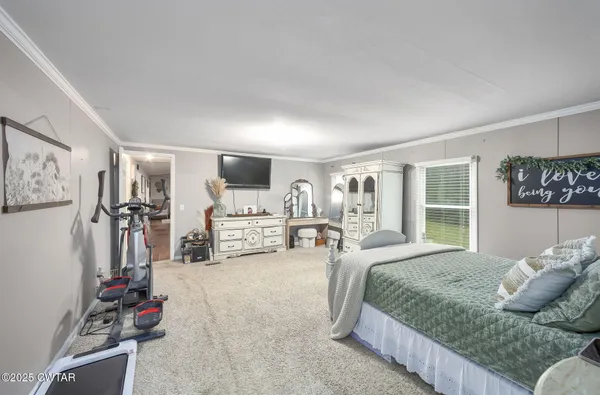 a front view of a house with a garden and porch