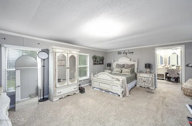 an aerial view of residential house with outdoor space