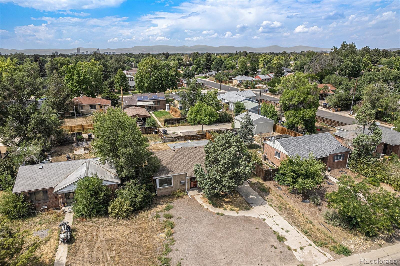 2141 Quebec Street Denver, CO 80207 - Photo 4 of 36 an aerial view of a houses with a yard