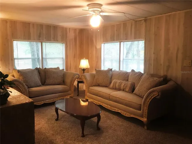 a livingroom with furniture and a couch