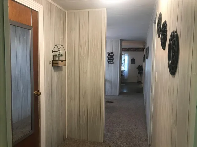a white toilet sitting next to a bathroom sink and tub