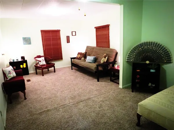 a living room with furniture and a couch