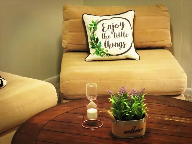 a living room with a couch and a table