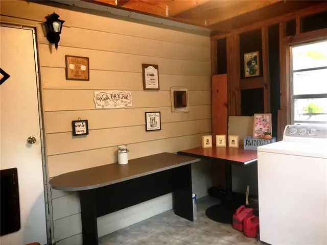 a room with workbench and window