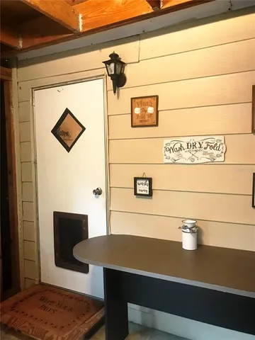 a view of a workspace with furniture