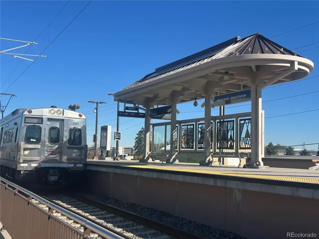 a view of a balcony with chairs