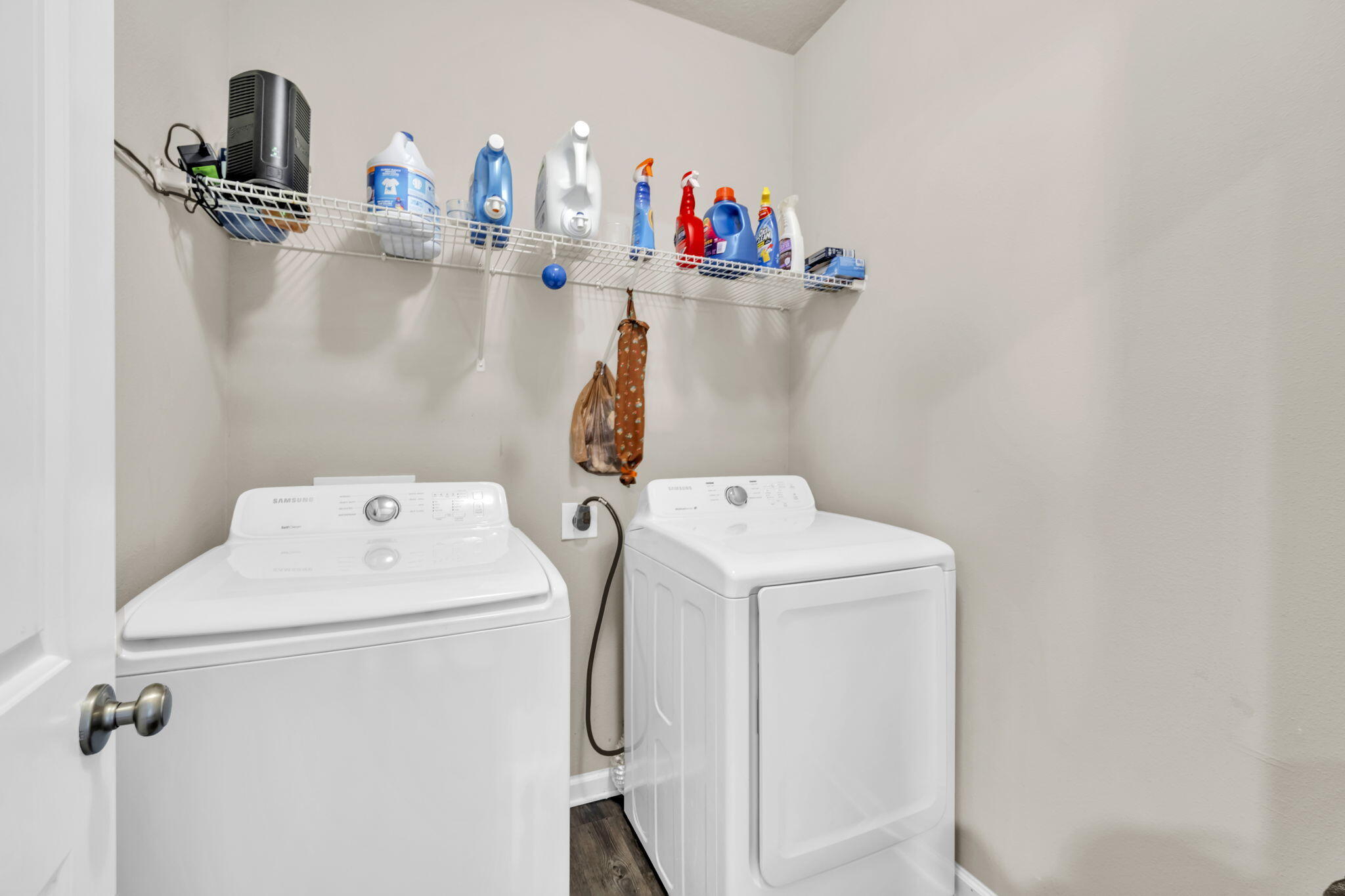 46 Cornelia Street Freeport, FL 32439 - Photo 18 of 49 a utility room with dryer and washer