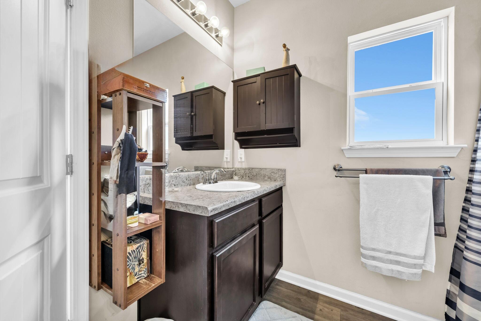 46 Cornelia Street Freeport, FL 32439 - Photo 6 of 49 a bathroom with a sink and a mirror
