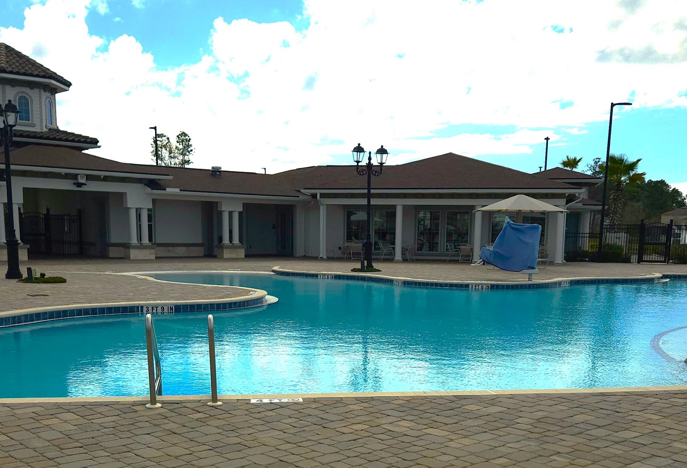 16 Encanto Way Street St. Augustine, FL 32084 - Photo 45 of 56 Community pool with a patio and a grill