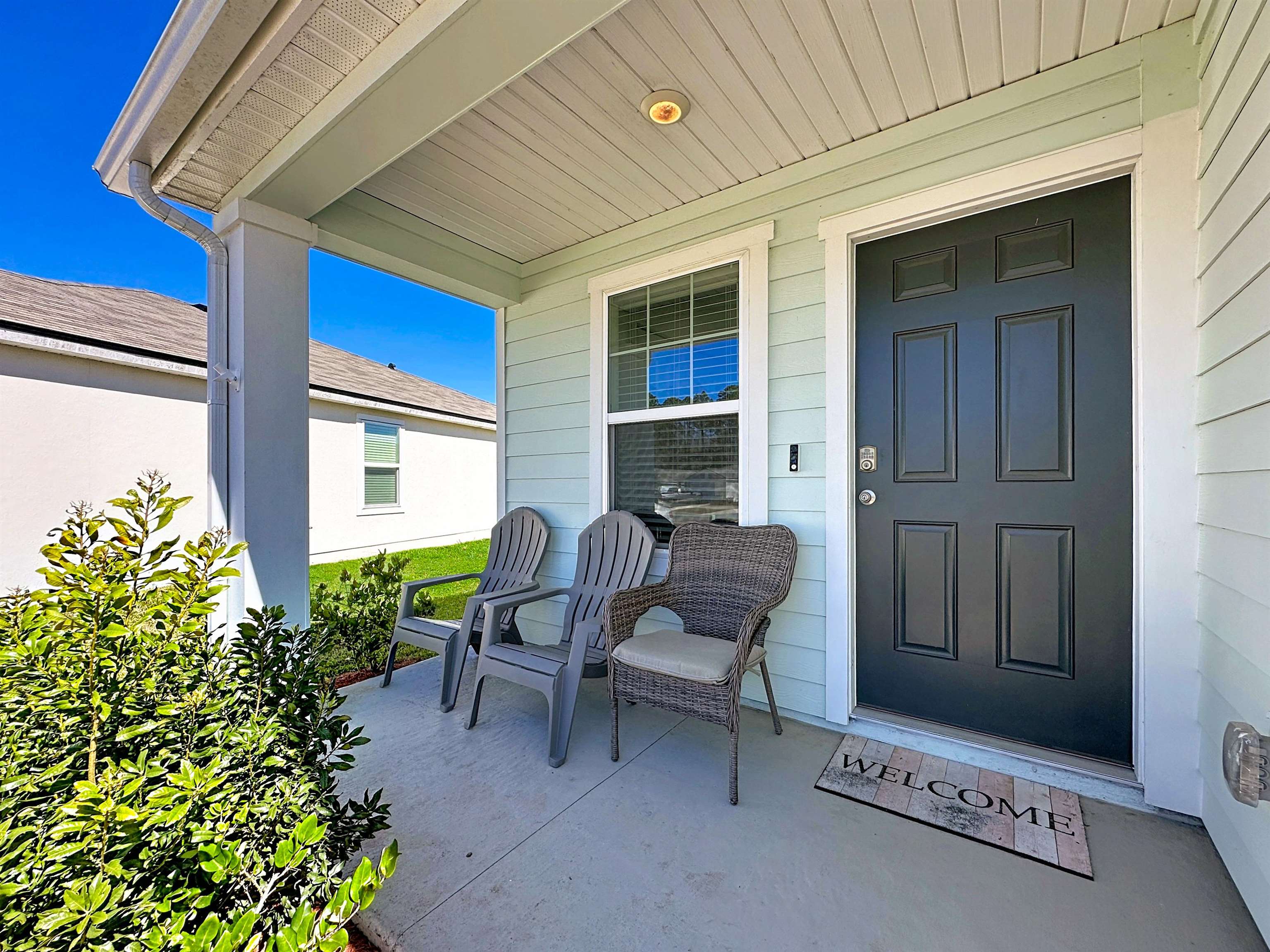 16 Encanto Way Street St. Augustine, FL 32084 - Photo 6 of 56 View of exterior entry with covered porch