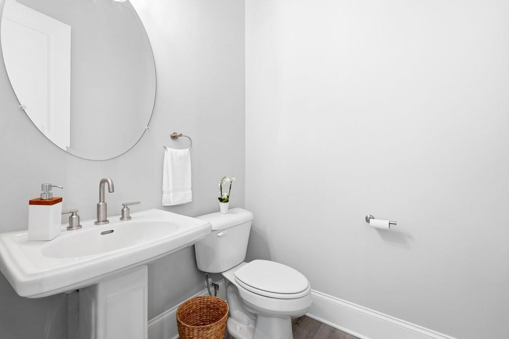 1363 Pavilion Street Southeast Atlanta, GA 30316 - Photo 11 of 25 a bathroom with a sink toilet and a mirror