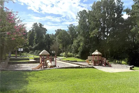 a view of a park with slide