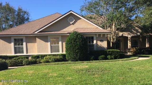 2120 West Quay Road St. Augustine, FL 32092 - Photo 1 of 12 a front view of a house with a yard
