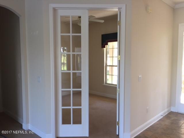 2120 West Quay Road St. Augustine, FL 32092 - Photo 5 of 12 a view of empty room with windows