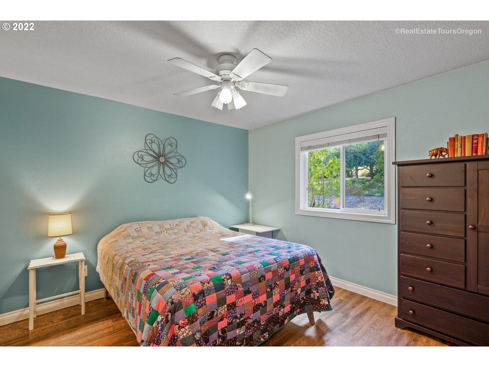 12715 South Casto Road Oregon City, OR 97045 - Photo 14 of 32 a bedroom with a bed and a window