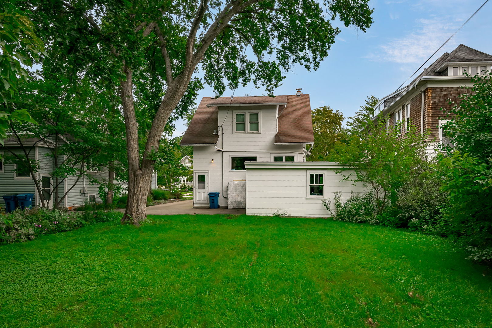 110 Pine Street Elmhurst, IL 60126 - Photo 6 of 7 a front view of house with a garden