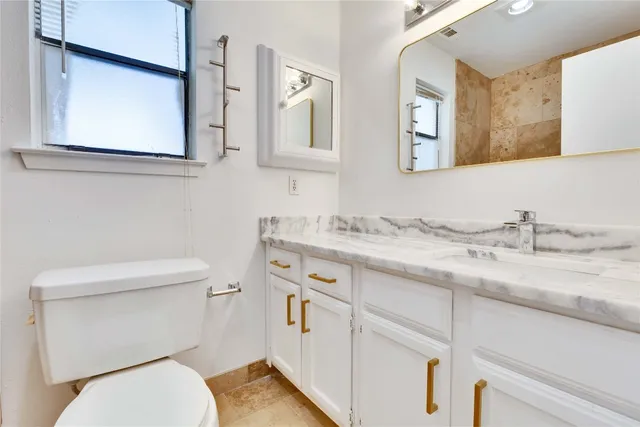 a view of balcony with furniture