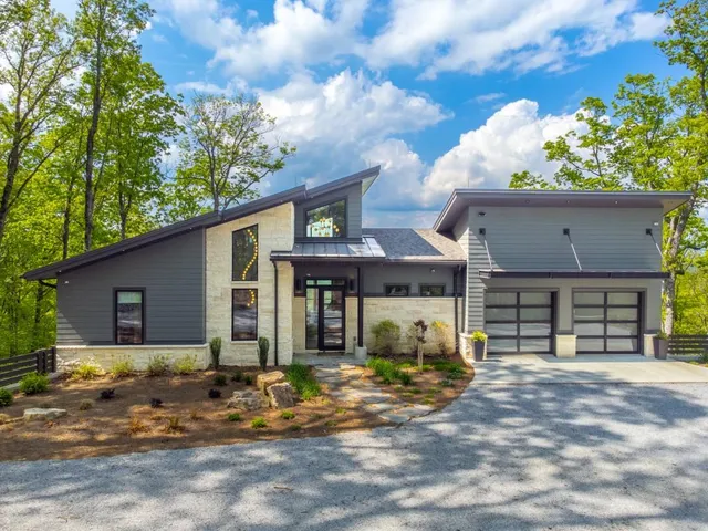 a front view of a house with a patio