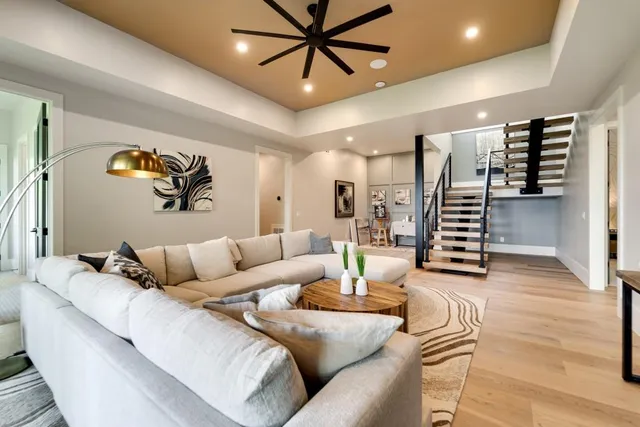 a bedroom with a bed and a couch