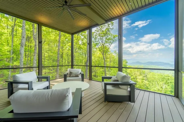 a bedroom with a bed and a table in it
