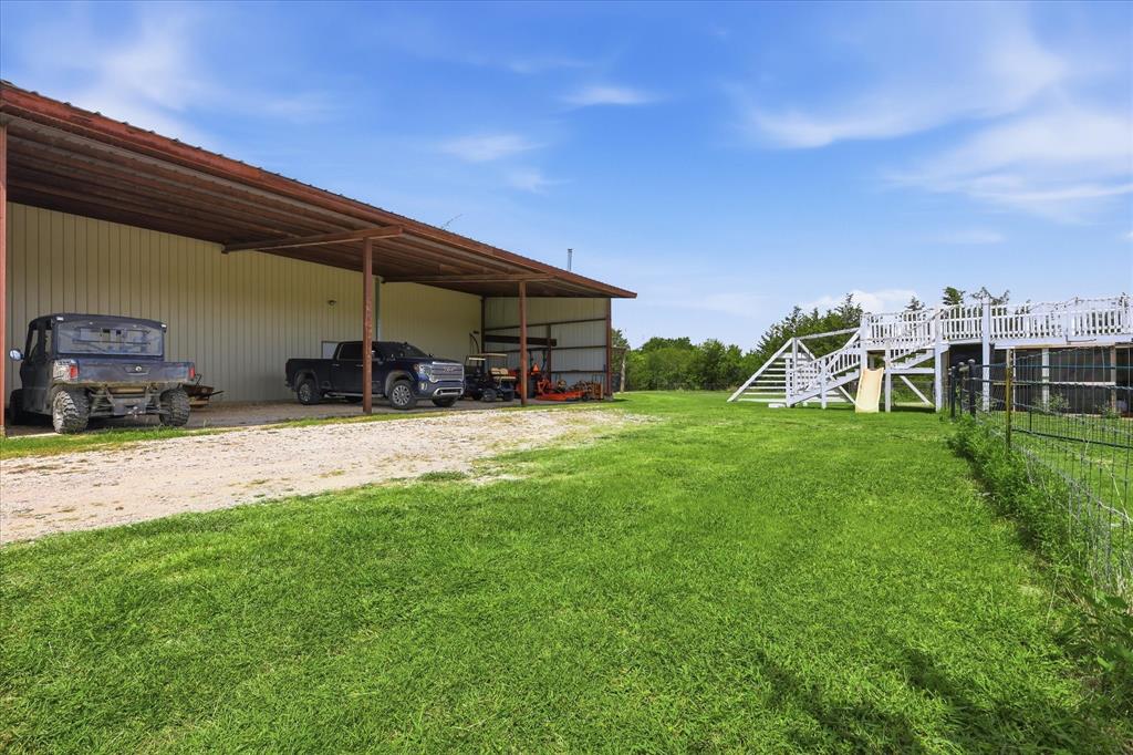 399 Brindley Road Maypearl, TX 76064 - Photo 32 of 39 Carport area off of worshop