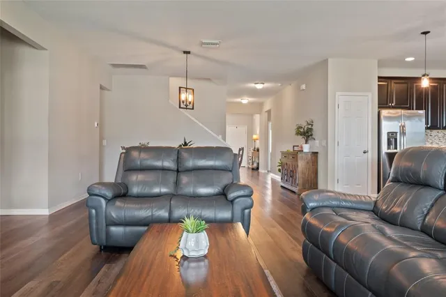 a view of entryway with wooden floor
