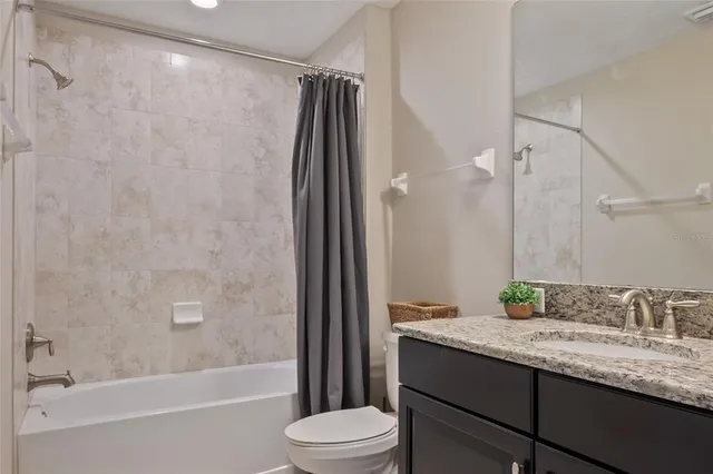 a aerial view of a house with a garden and plants
