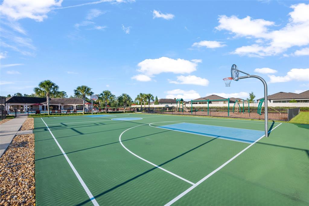 18428 Malinche Loop Spring Hill, FL 34610 - Photo 58 of 62 a view of a tennis court