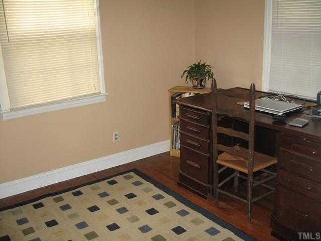 632 Brighton Road Raleigh, NC 27610 - Photo 6 of 12 a view of a workspace with furniture