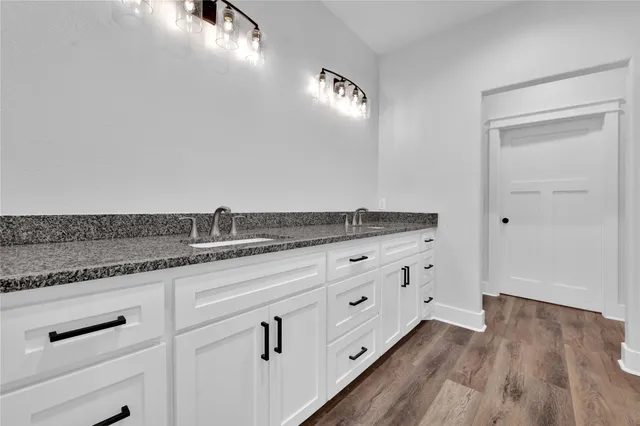 a room with cabinets and window