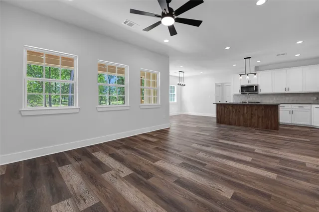 a view of kitchen and windows