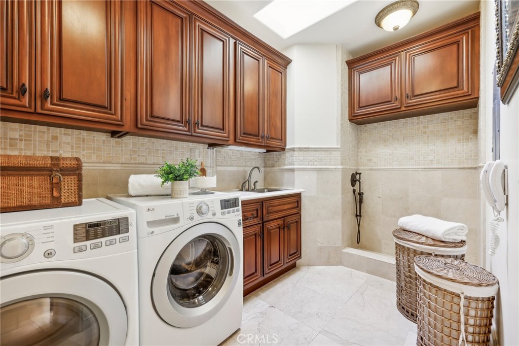 60 Ritz Cove Drive Dana Point, CA 92629 - Photo 53 of 76 Second Floor Laundry Room with pet shower.