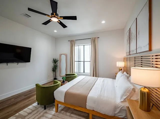 a kitchen with a stove and cabinets