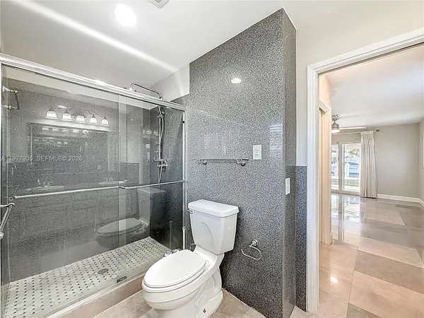 a view of a swimming pool with a porch