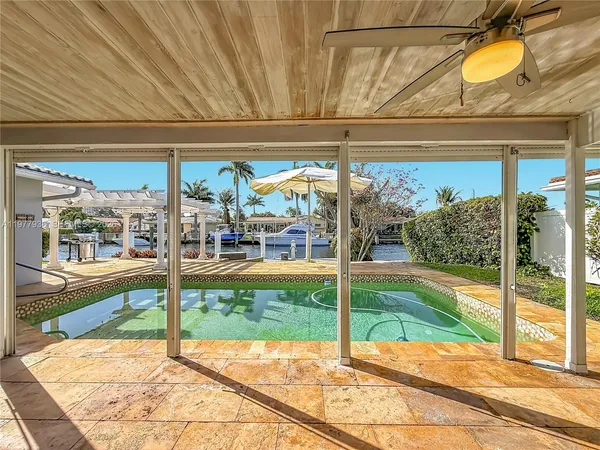 a view of a house with a swimming pool