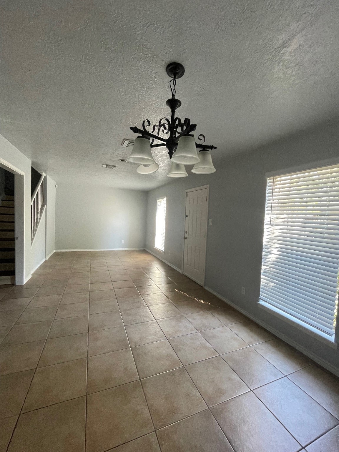 9250 Beechnut Street, Unit 21 Houston, TX 77036 - Photo 3 of 18 a view of a kitchen with a sink and a window