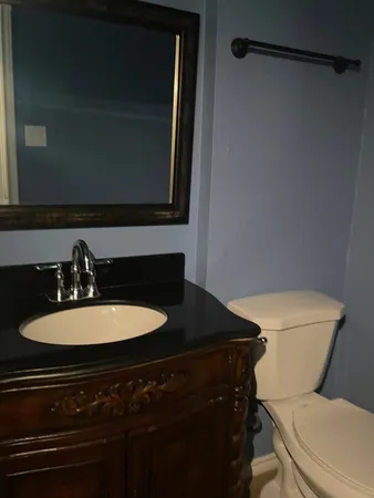 a bathroom with a sink and a toilet