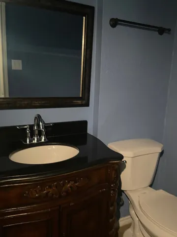 a bathroom with a sink and a toilet