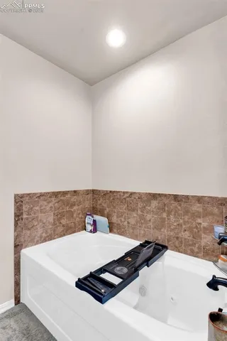a bathroom with a bathtub