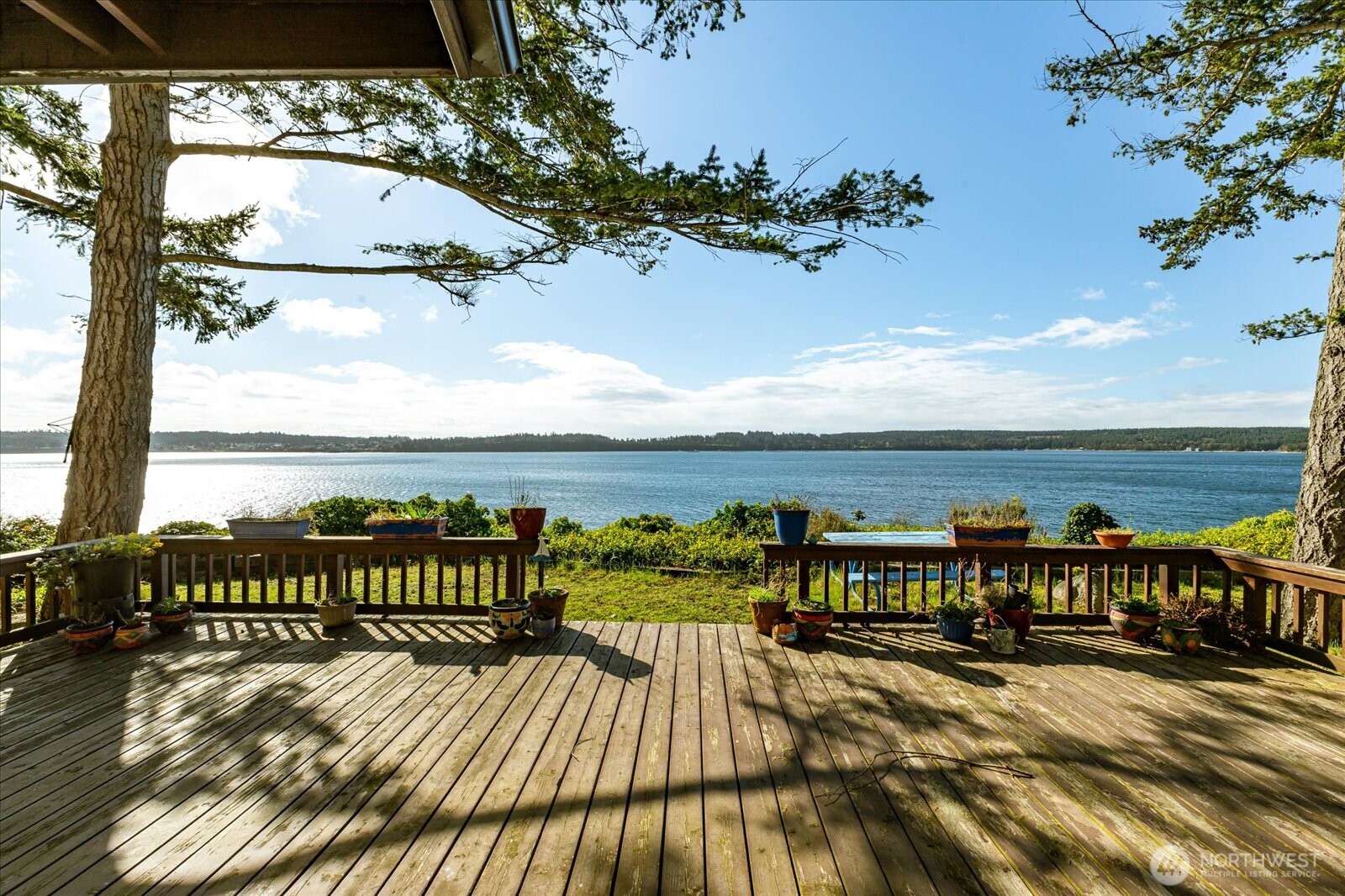 1677 Penn Cove Road Oak Harbor, WA 98277 - Photo 1 of 40 a view of a balcony with an ocean view